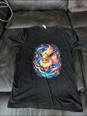 Bella Canvas Black Tee with Vibrant Multicolor Flareon Pokemon Eevee Print